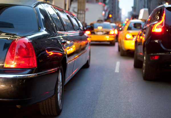 Limo driving on a street